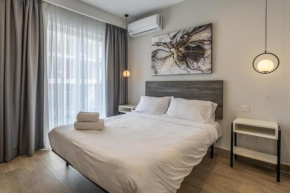 Studio 33 with twin beds & kitchenette at the new Olo living